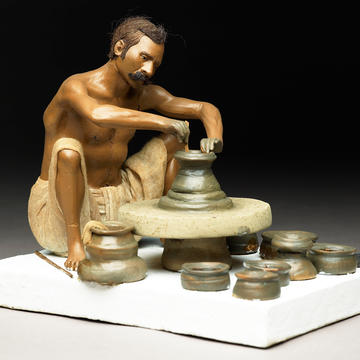Model depicting a potter turning a pot on a wheel Krishnanagar, Bengal, India c. 1885-86  